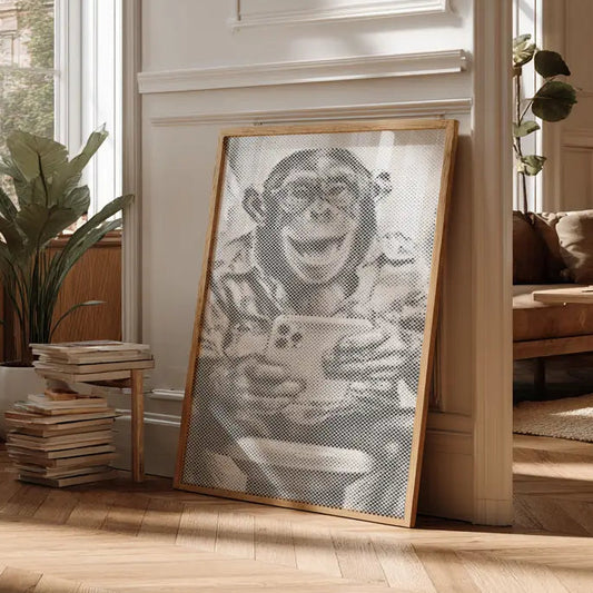 Framed artwork of a monkey in a modern living room with large windows. Laughing Monkey with Selfie | Dot Painting Kit