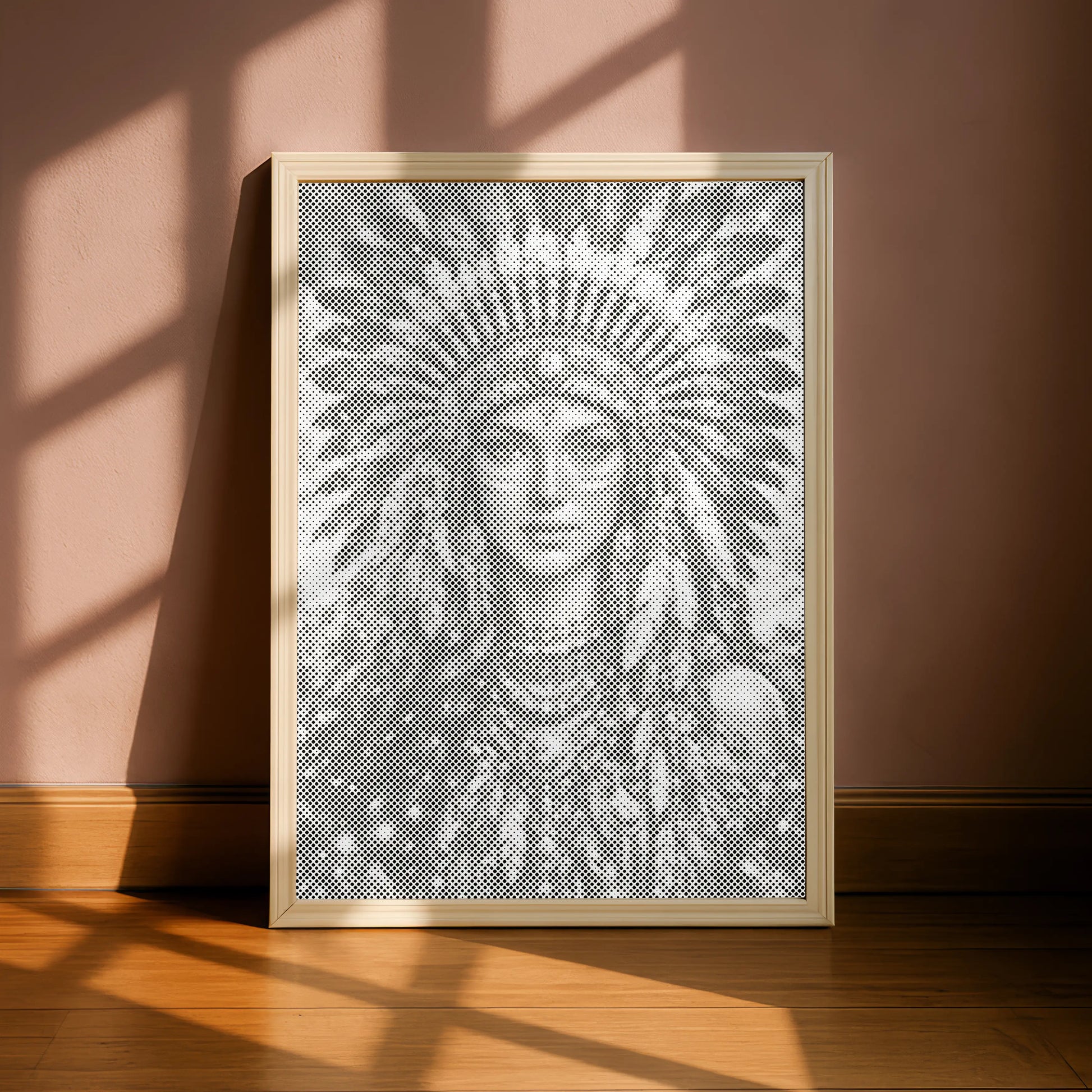 Framed artwork of a person wearing a headdress on a wall with sunlight casting shadows. Native American Woman Portrait | Dot Painting Kit